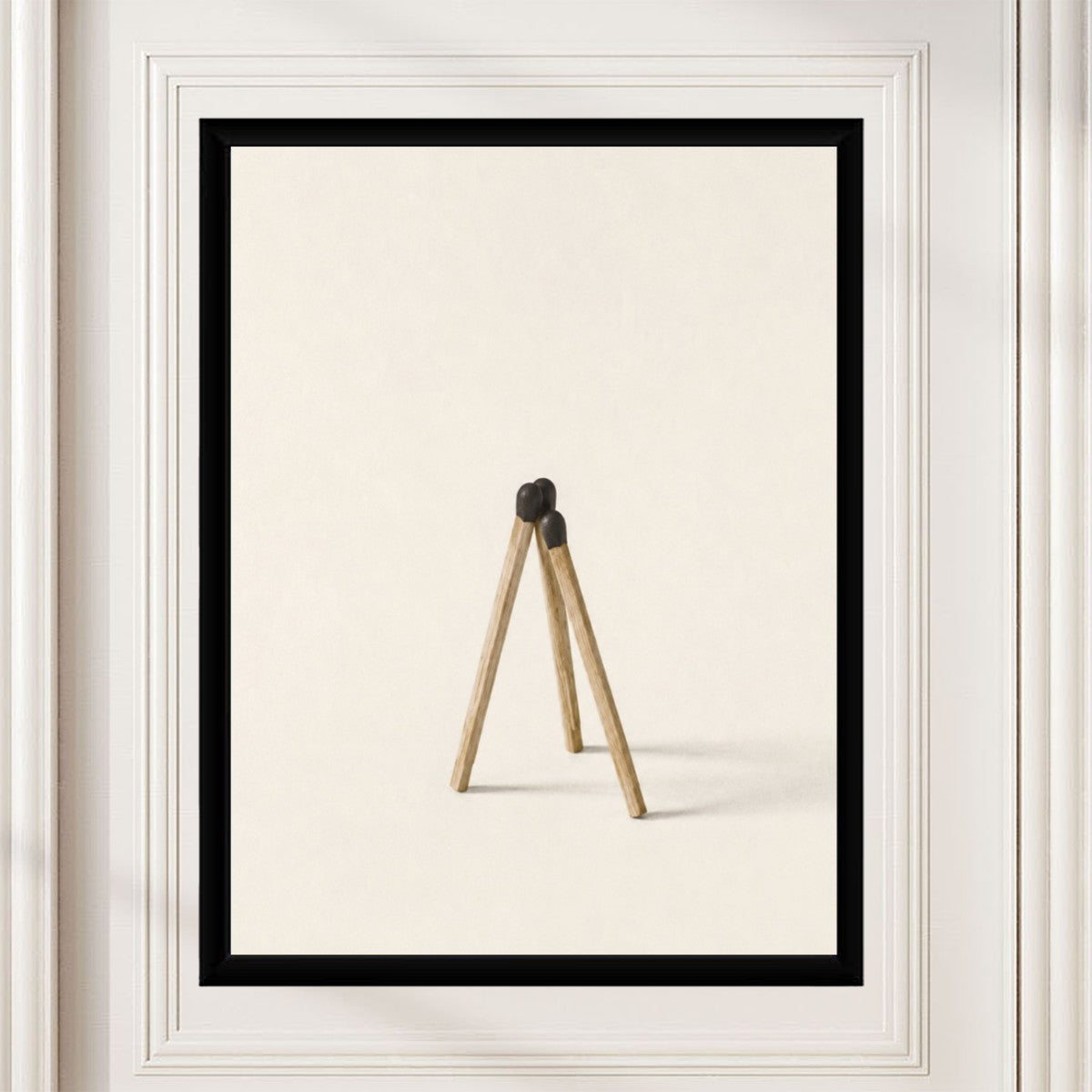 The matchsticks composition poster elegantly presented in a professional office setting.