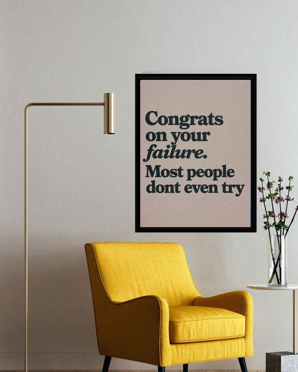 An office space featuring the Congrats on Your Failure Poster