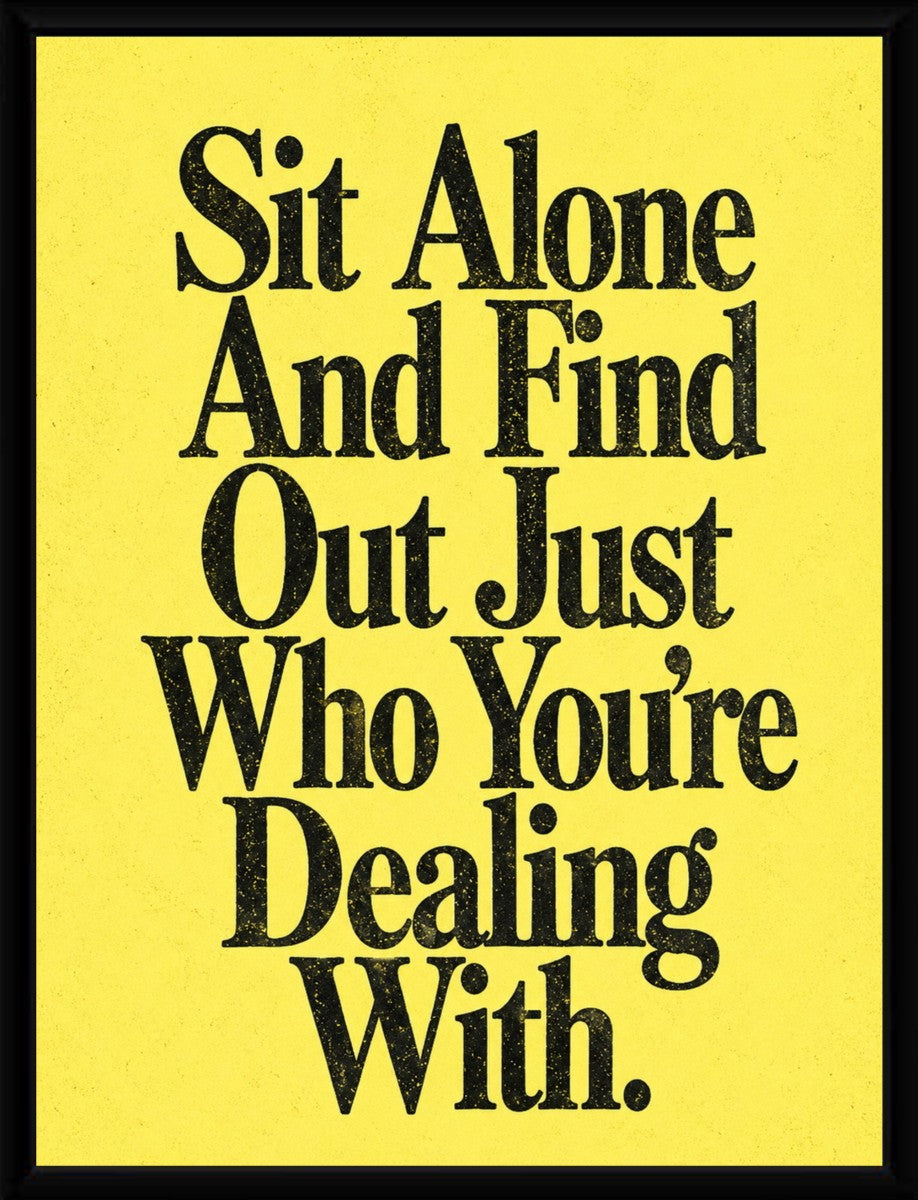 The poster framed in a modern black frame, highlighting its bold yellow background and motivational quote.