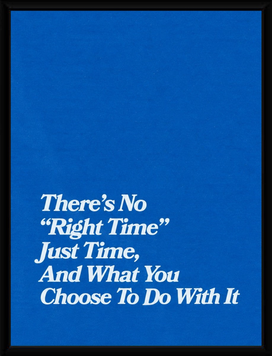 The motivational poster elegantly displayed in a sleek black frame, enhancing its vibrant message.