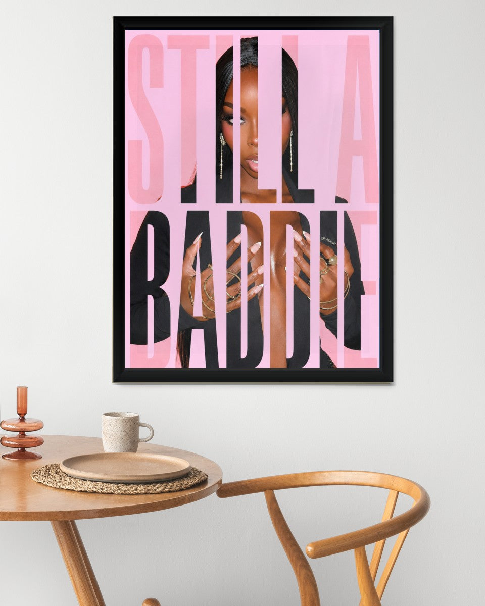The 'Still a Baddie' poster featured in a modern mockup, enhancing a cheerful and vibrant space.