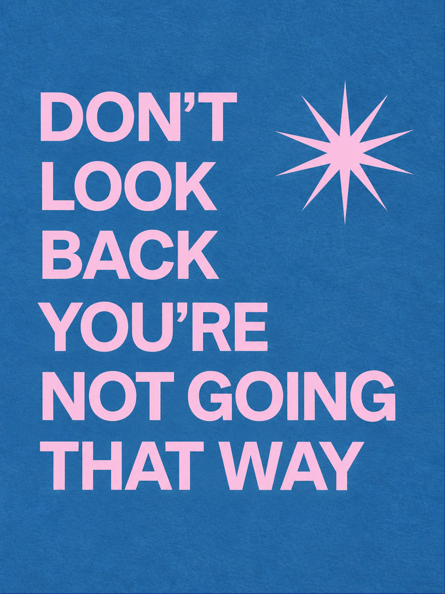 A colorful motivational poster featuring the quote 'DON'T LOOK BACK YOU'RE NOT GOING THAT WAY'.