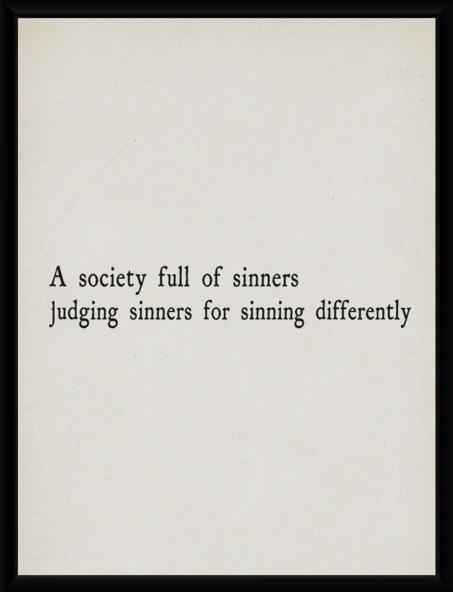 The 'Society of Sinners' poster elegantly displayed in a sleek black frame, enhancing its minimalist design.