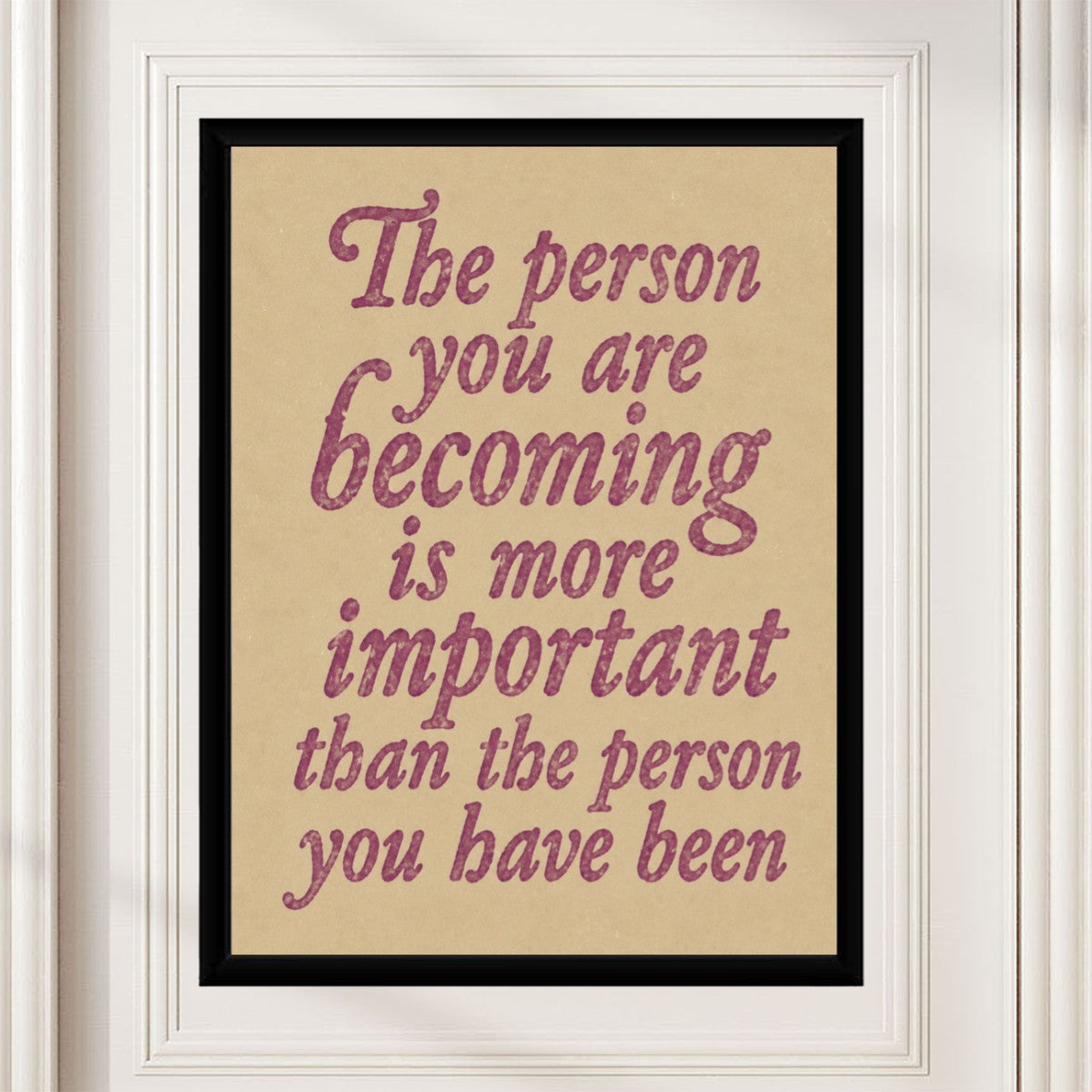 The 'Becoming Important' poster showcased in a cozy workspace, emphasizing motivation and transformation.