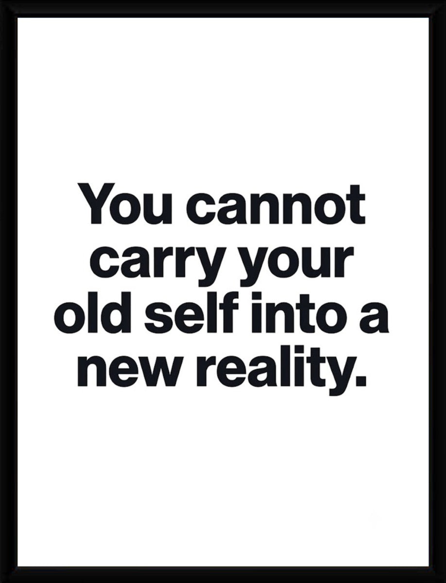 The 'New Reality Quote Poster' displayed in a sleek, modern frame.
