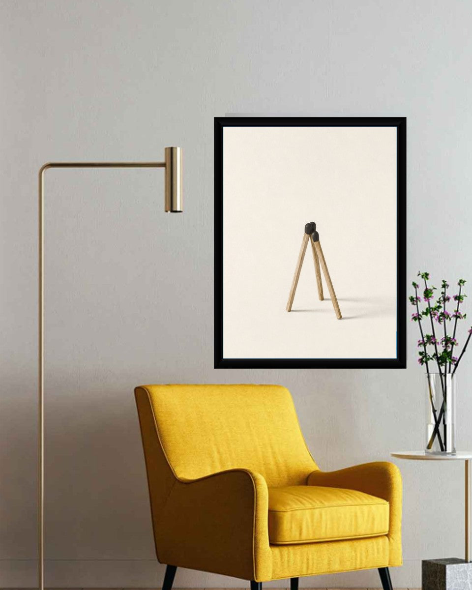 The matchsticks composition poster styled in a bright office space with clean lines.