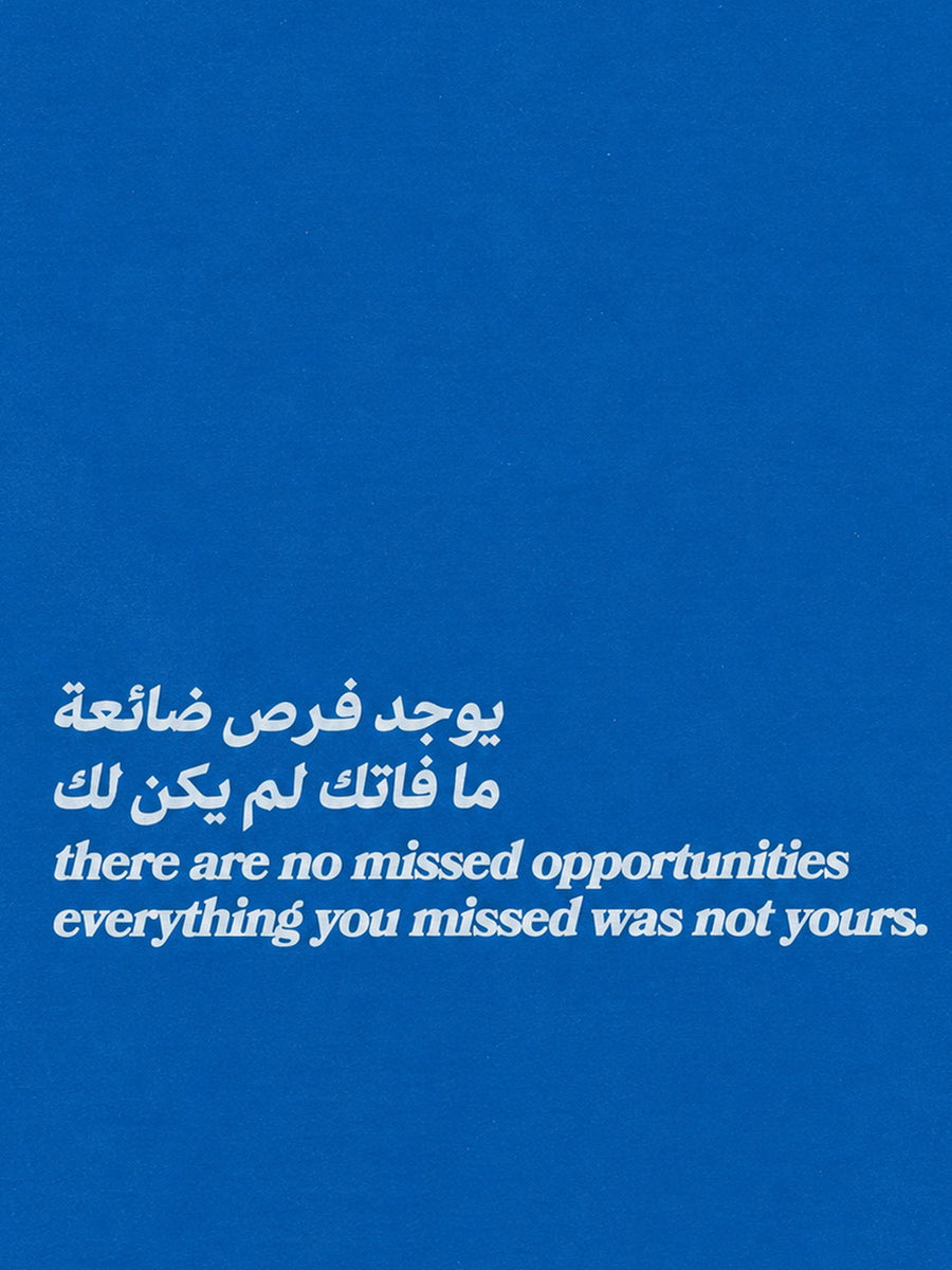 A colorful motivational poster featuring the quote 'there are no missed opportunities' with Arabic text, designed to inspire