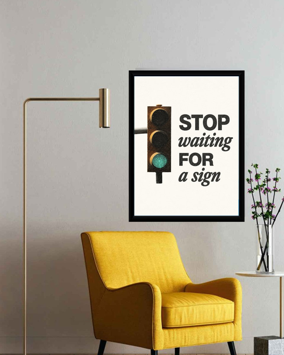 The motivational poster showcasing 'STOP waiting FOR a sign' in a bright and stylish office environment.