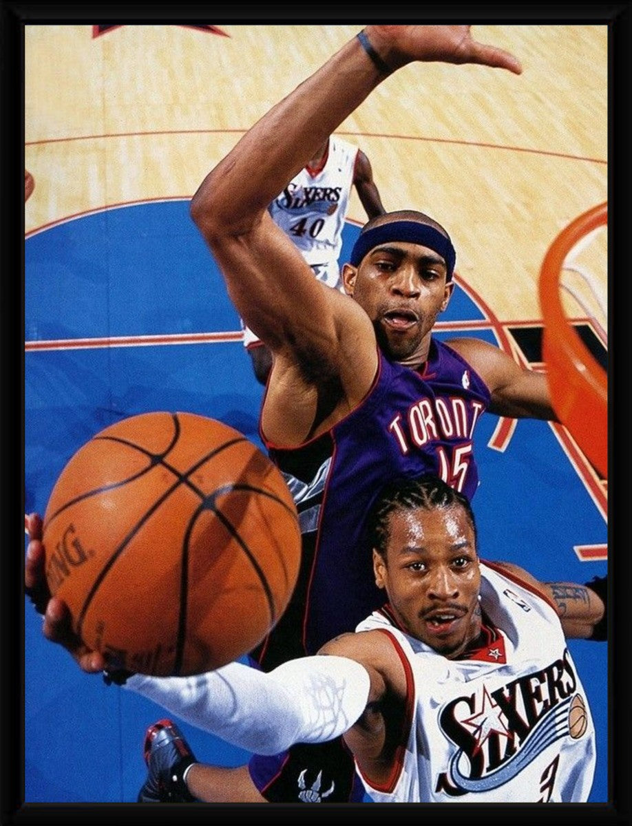 Vince Carter Dunk Poster framed elegantly, highlighting the vivid colors and dynamic composition.