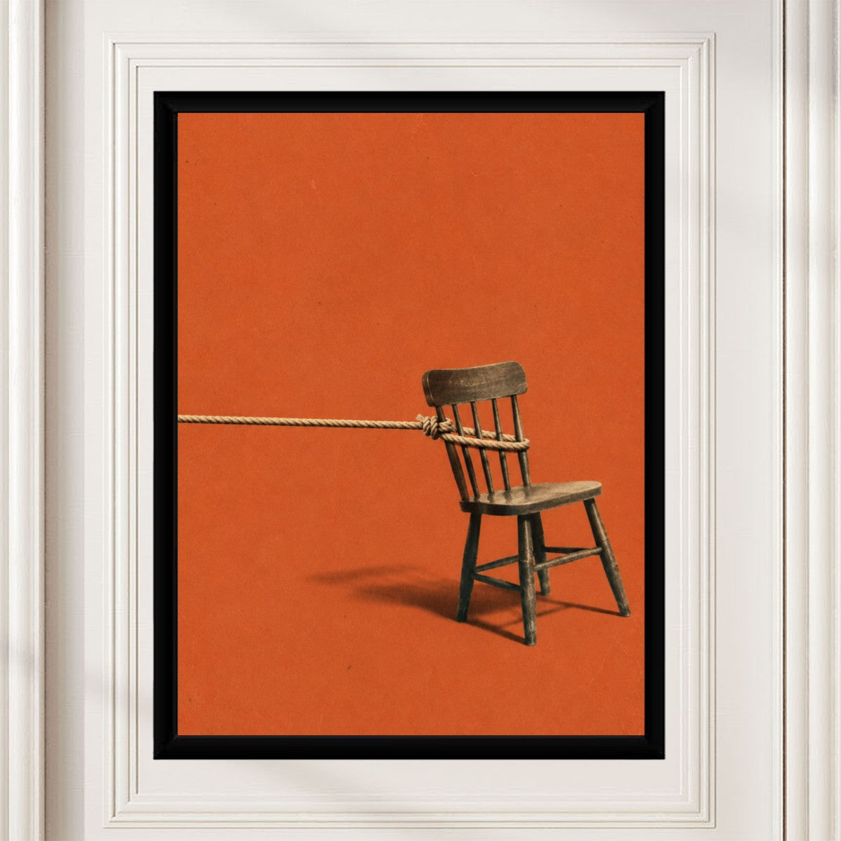 A styled mockup of the Red Chair Poster, enhancing a contemporary office space aesthetic.