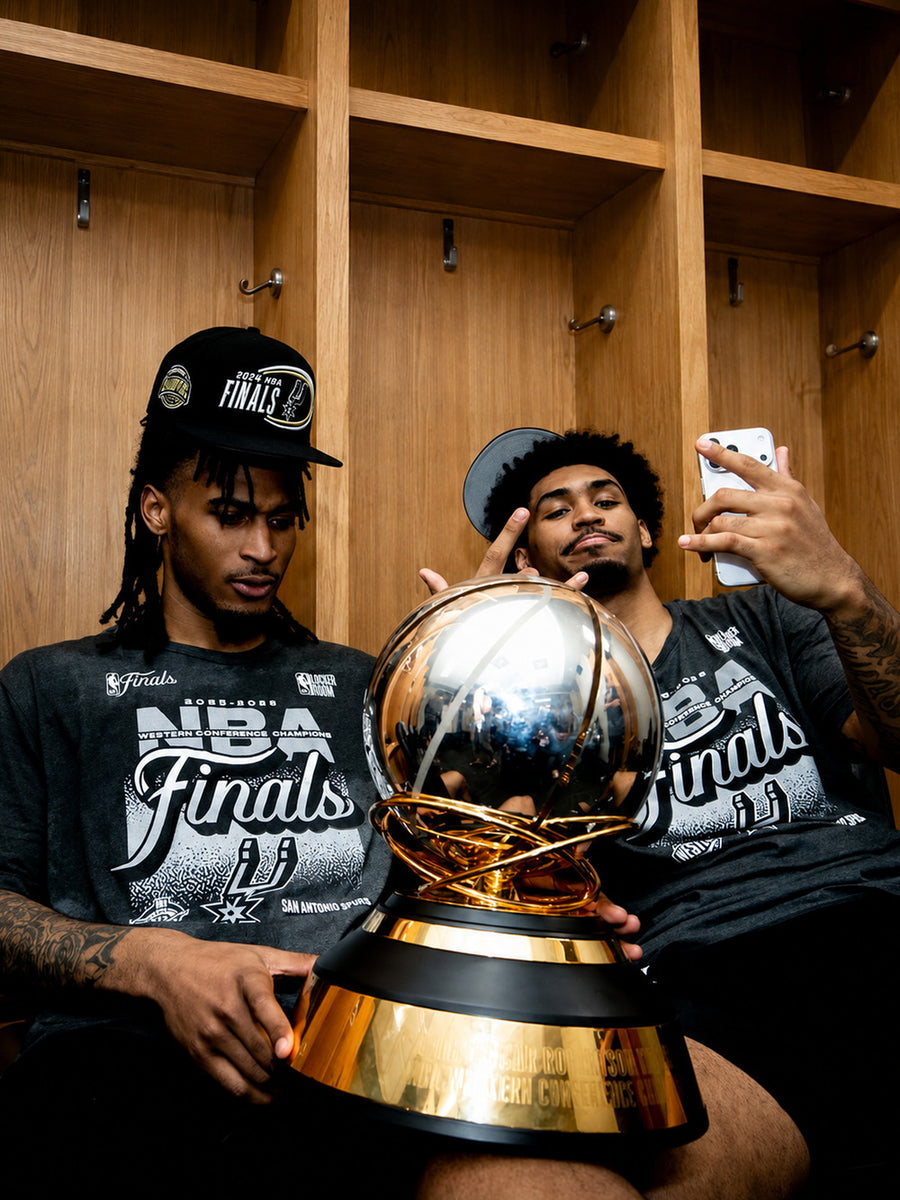 A colorful poster featuring Stephon Castle and Harper celebrating with a championship trophy, embodying the spirit of the San