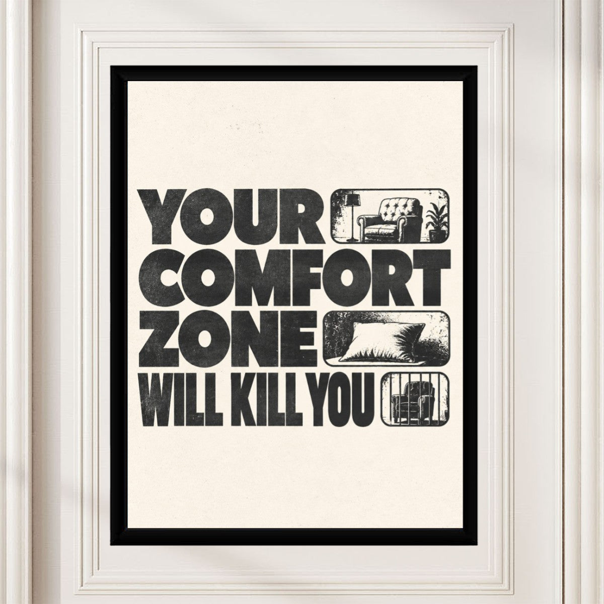 The 'Your Comfort Zone Will Kill You' poster showcased in a bright workspace setting.