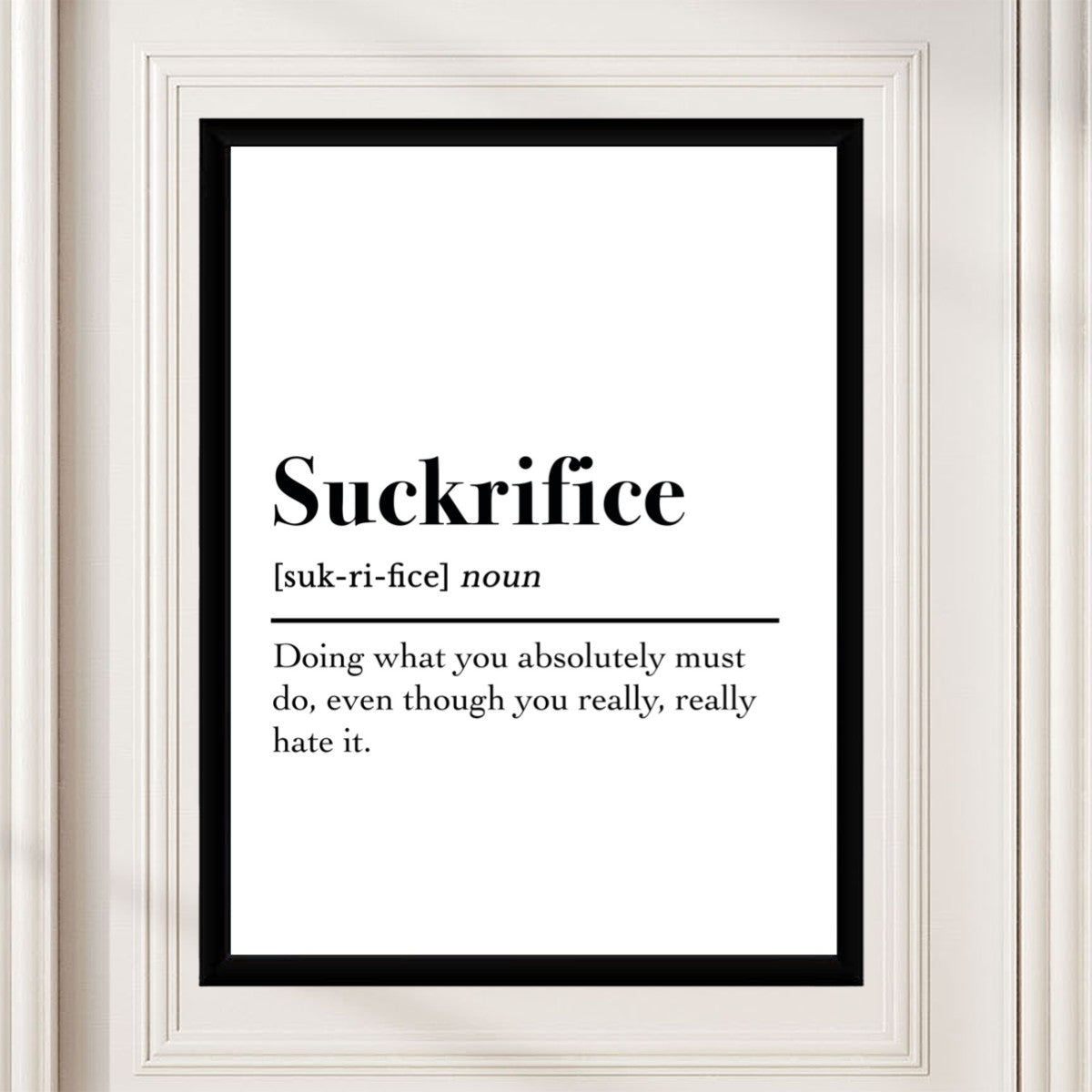 The Suckrifice definition poster presented in a cozy workspace environment.