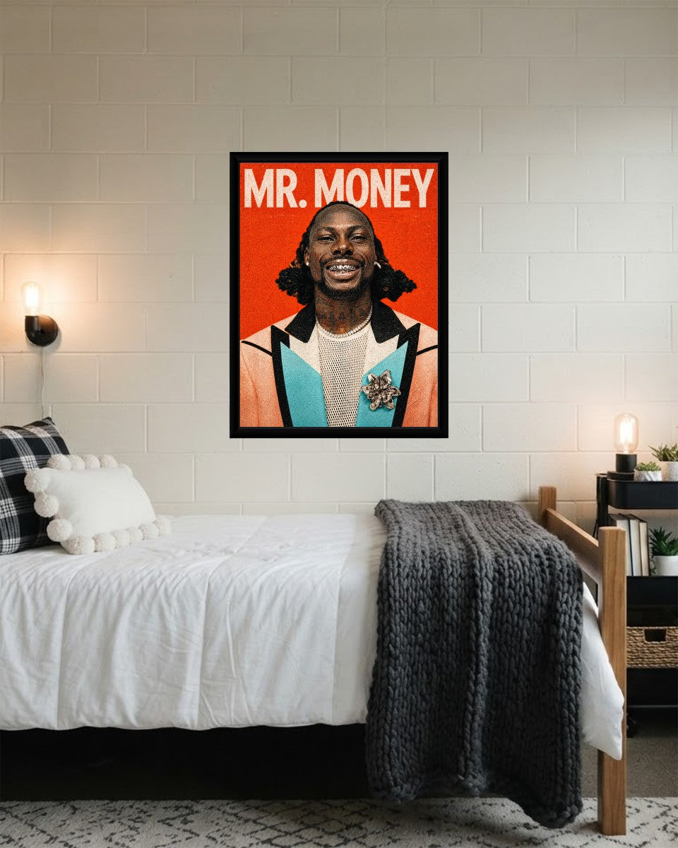 The Asake: Mr. Money poster elegantly styled in a cozy workspace, adding a lively touch to the atmosphere.