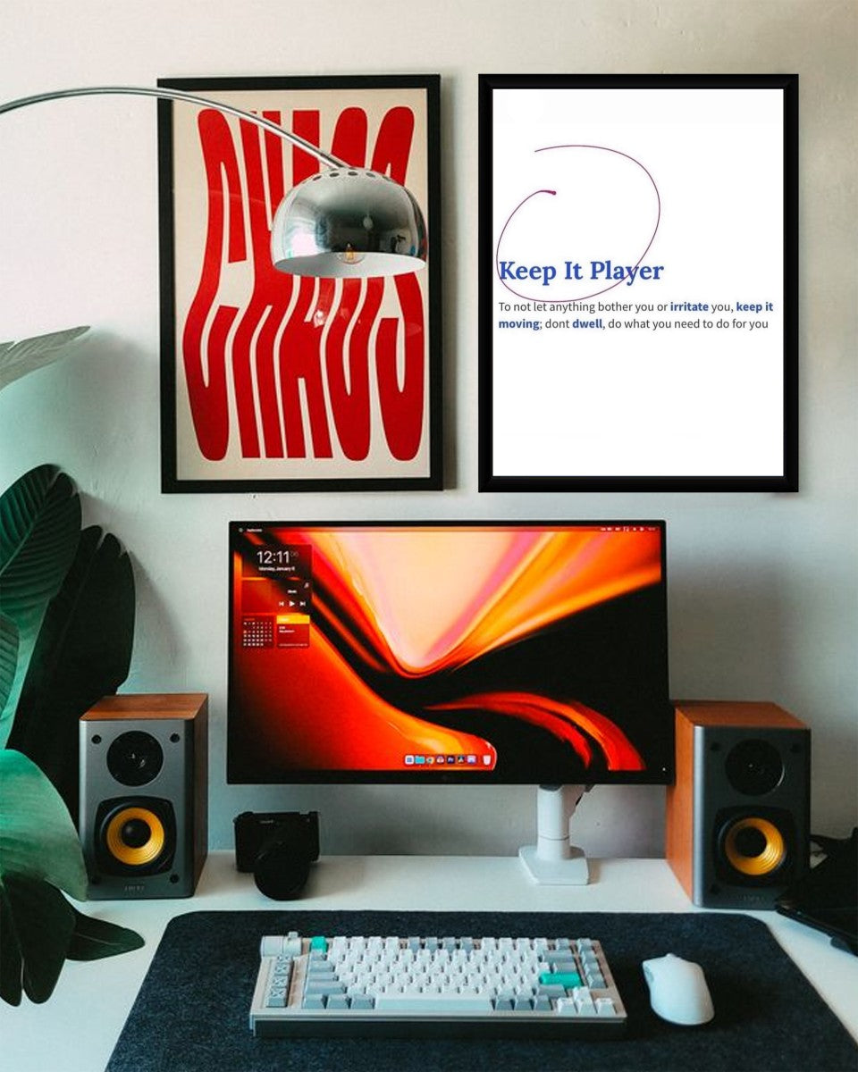 The 'Keep It Player' poster displayed in a contemporary styled setting, showcasing its motivational message.