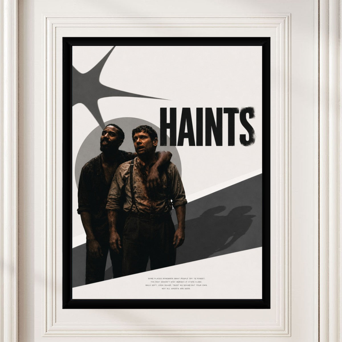 Sinners poster styled in a minimalist office setting.