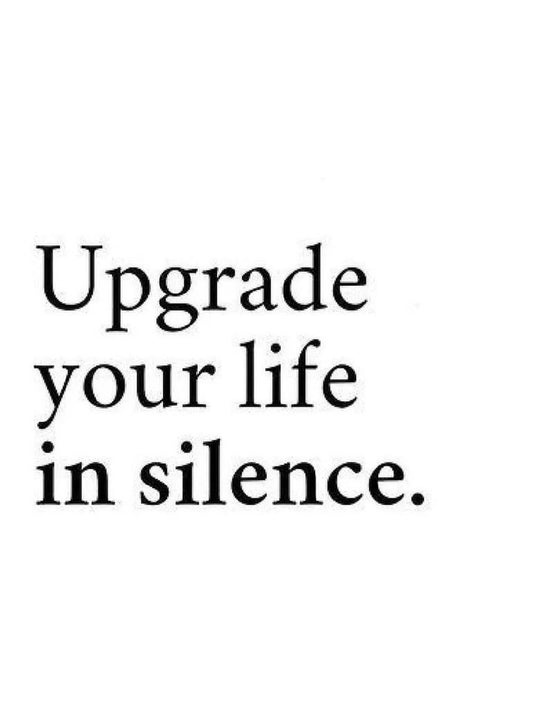 Minimalist poster featuring the quote 'Upgrade your life in silence.' in a light color scheme.