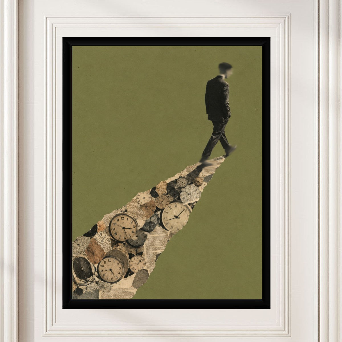 The man walking away poster prominently featured in a bright workspace, complementing a modern decor style.