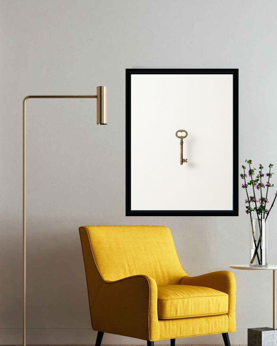 The vintage key poster styled in an elegant office environment, emphasizing its minimalist aesthetic.