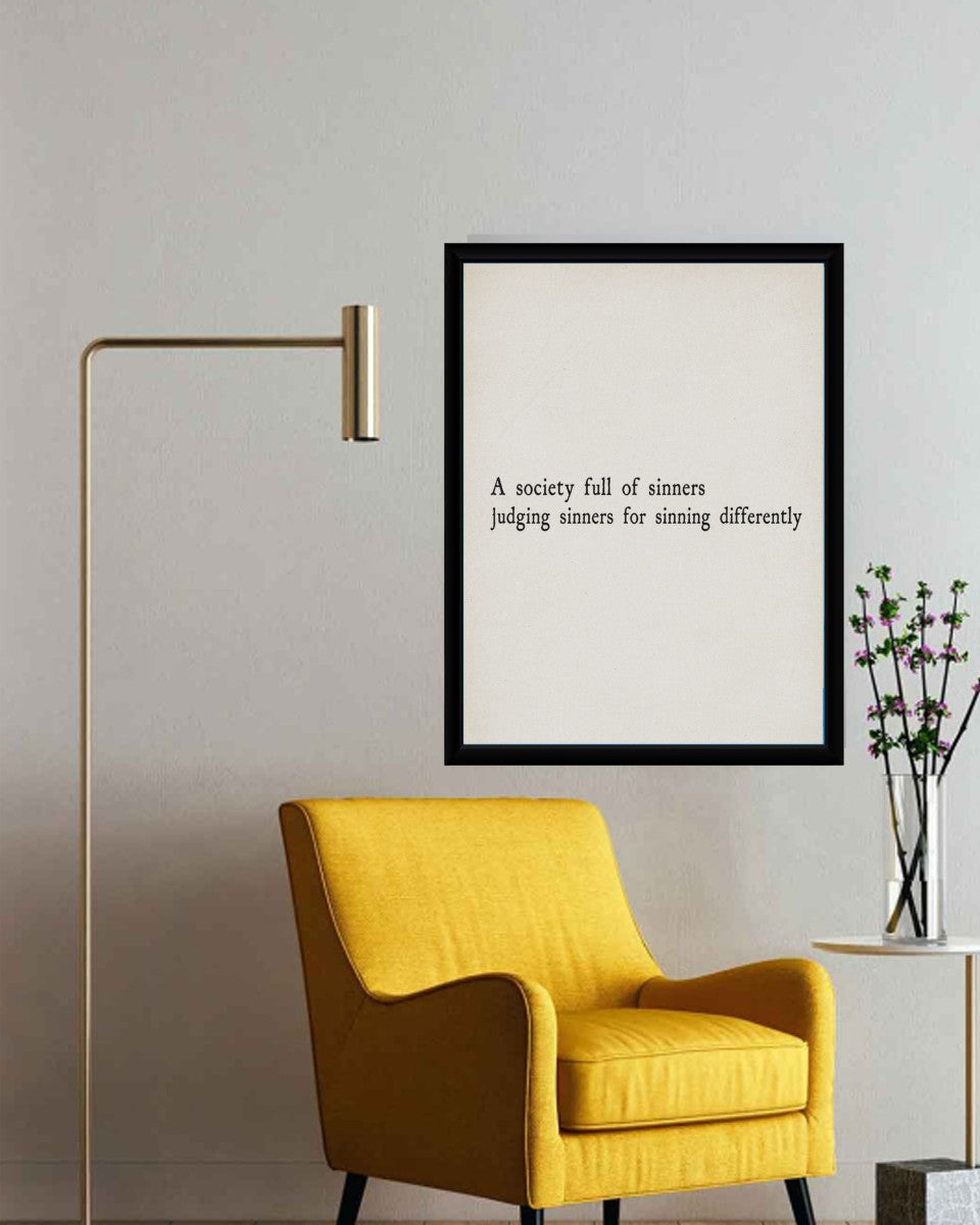 The 'Society of Sinners' poster showcased in a modern office setting, inspiring reflection and discussion.