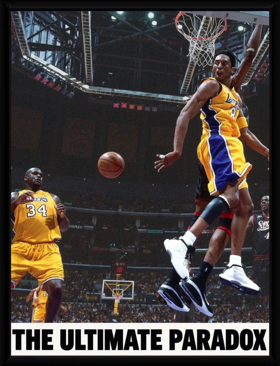 The poster of Kobe Bryant passing to Shaquille O'Neal displayed in a sleek frame, enhancing its visual impact.