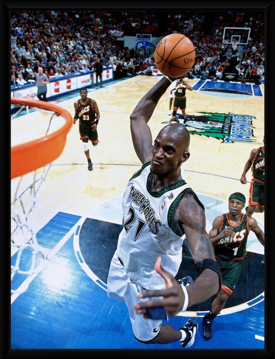 Kevin Garnett Dunk Poster displayed in a sleek black frame, enhancing the vibrant colors of the artwork.