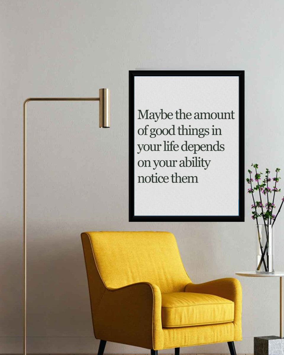 Good Things in Life poster arranged in a stylish office setting.