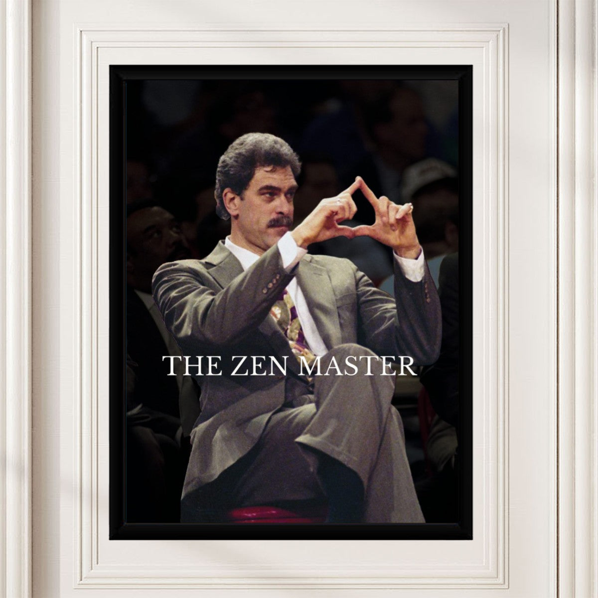 The Phil Jackson Zen Master Poster styled in a modern office setting, showcasing its inspirational theme.