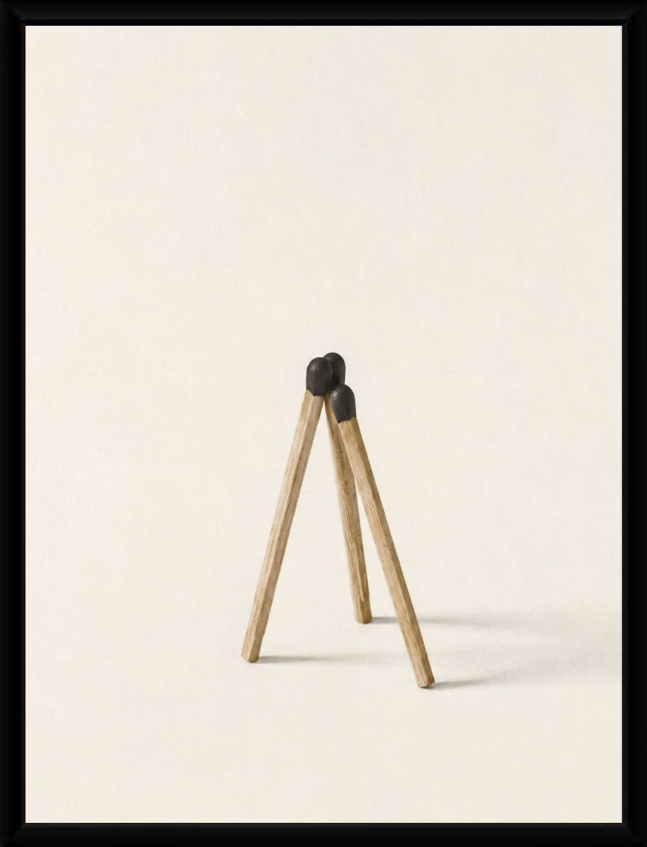 The minimalist matchsticks poster displayed in a sleek, modern frame.