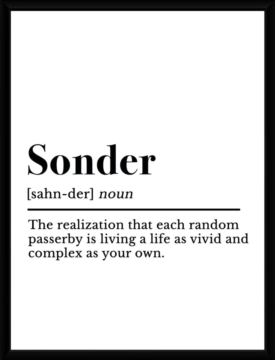 Sonder definition poster displayed in a sleek frame, highlighting its modern design.