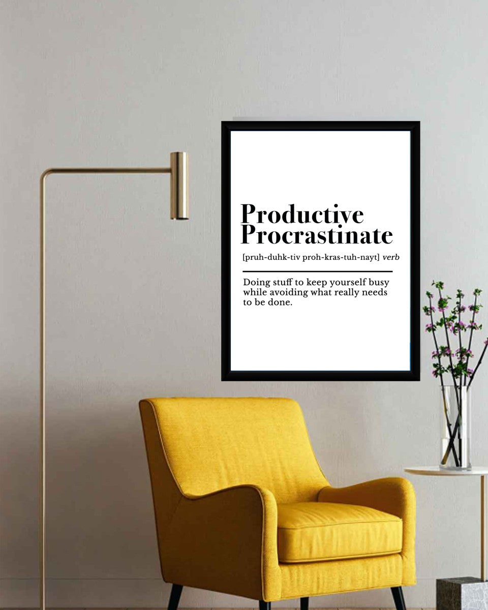 The 'Productive Procrastinate' poster displayed in a stylish office setting, enhancing the motivational atmosphere.