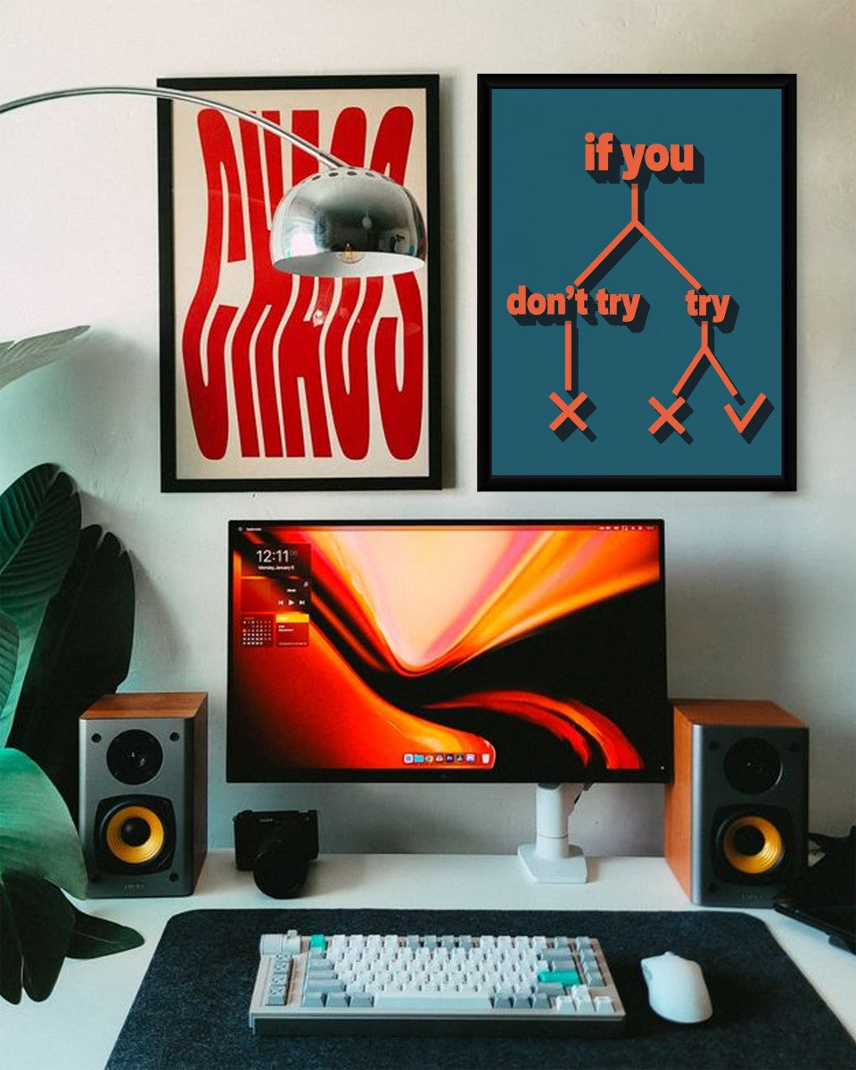 The 'Try or Don't Try' poster beautifully framed and styled in a modern office environment.