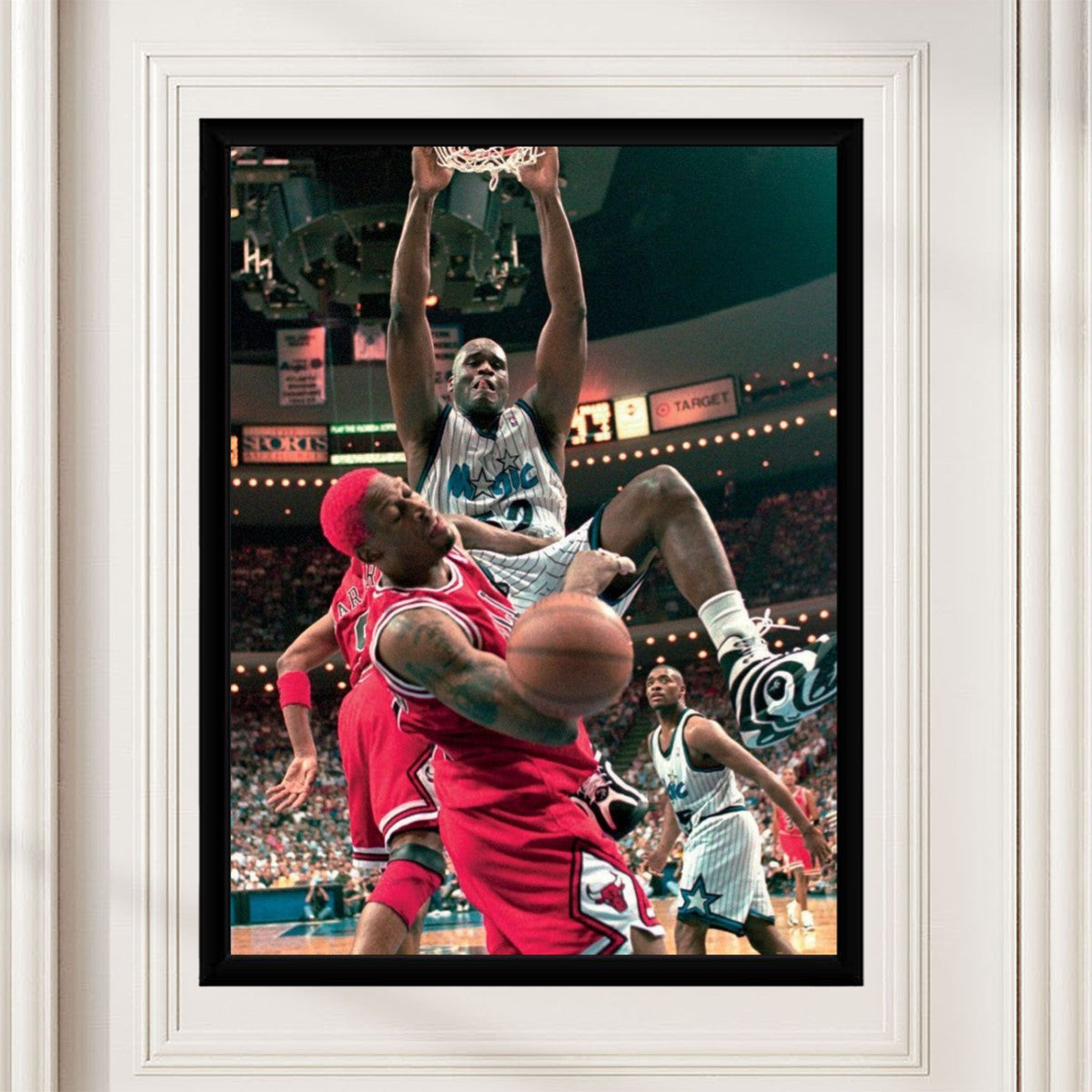 The Shaquille O'Neal over Dennis Rodman poster displayed in a modern home setting with stylish decor.