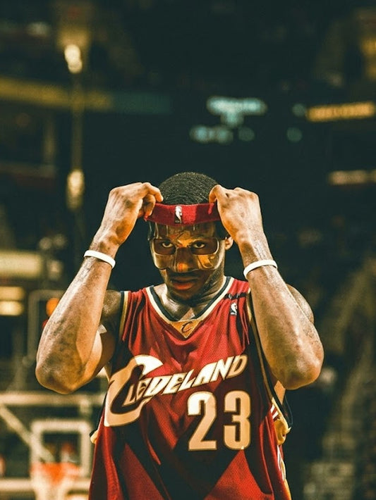 A vibrant poster featuring LeBron James in an action-packed basketball moment.