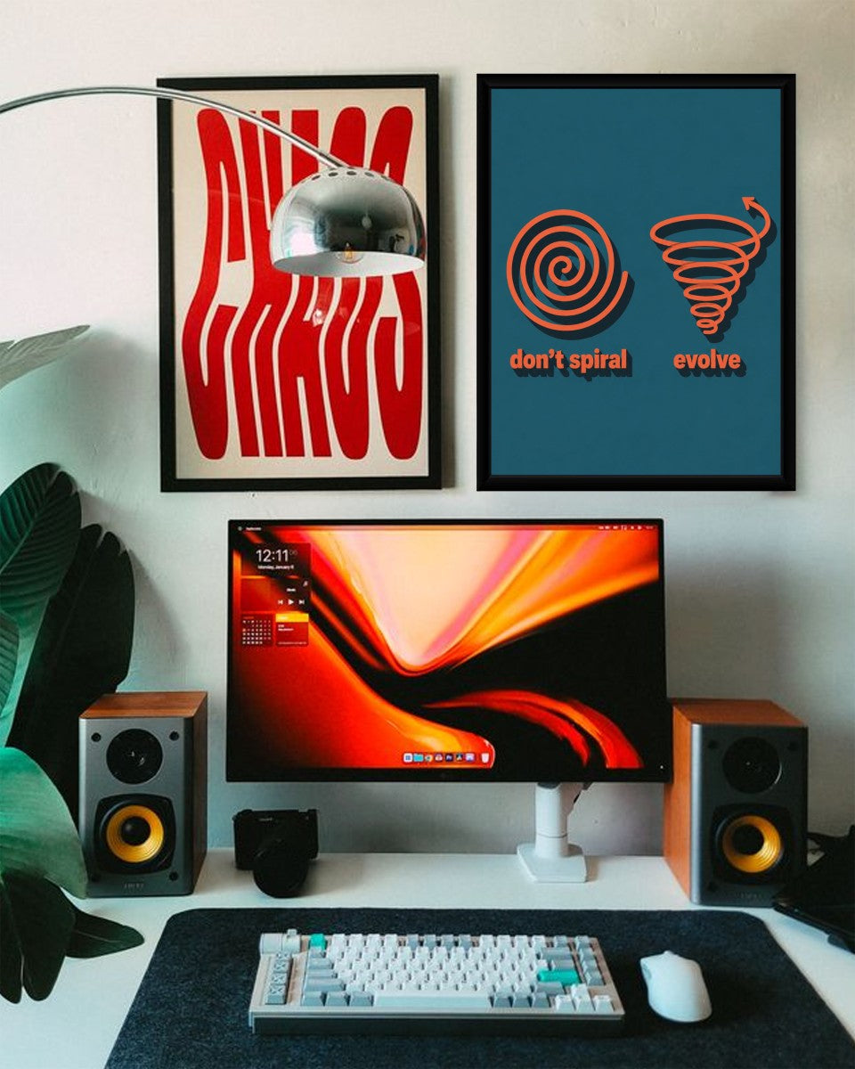 The 'Don't Spiral, Evolve' poster displayed in a bright, stylish room, adding a motivational vibe.
