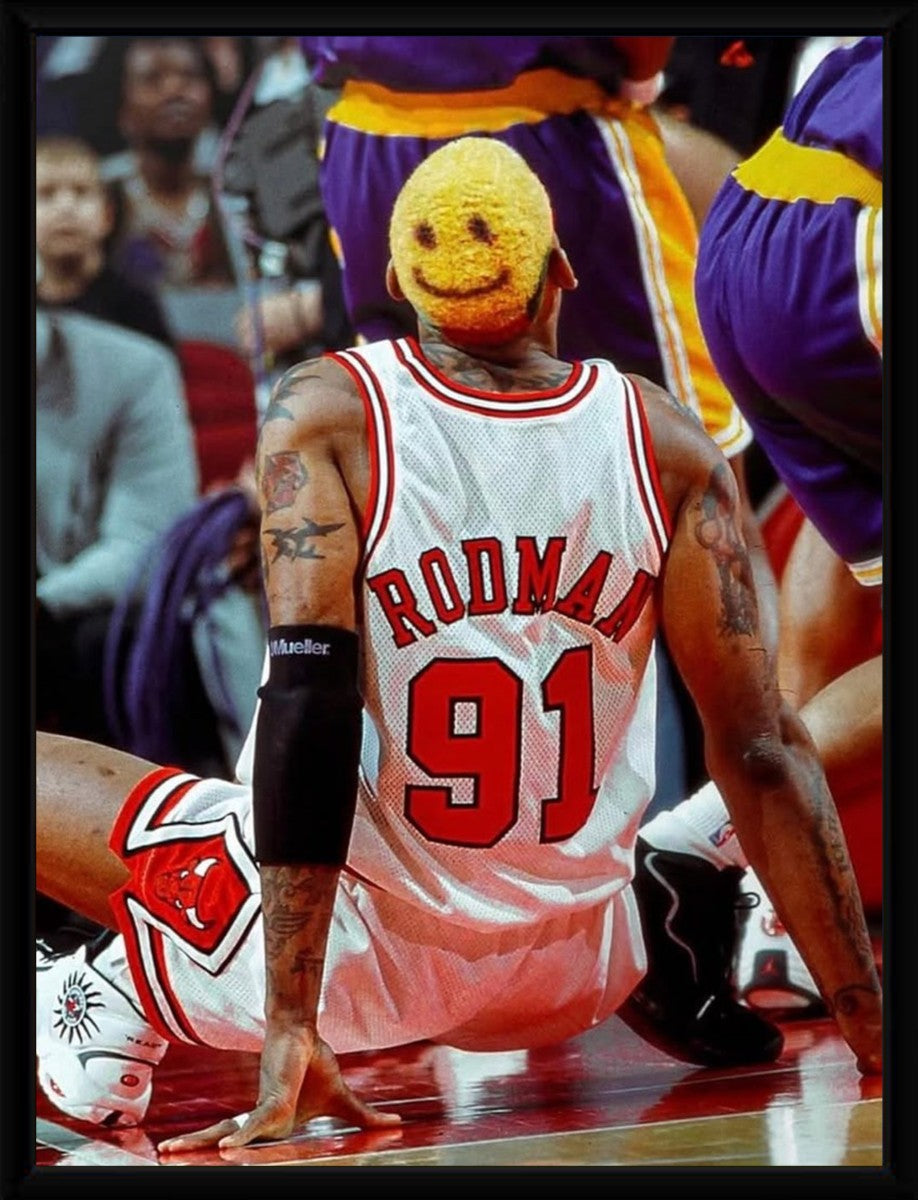 Dennis Rodman basketball poster displayed in a sleek black frame.