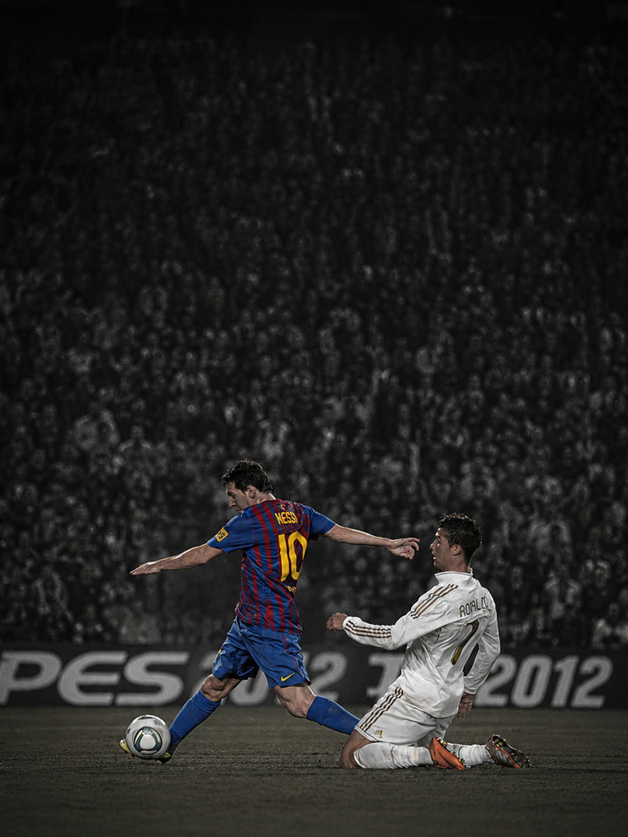 Dynamic action shot of Messi vs Ronaldo showcasing their legendary rivalry.