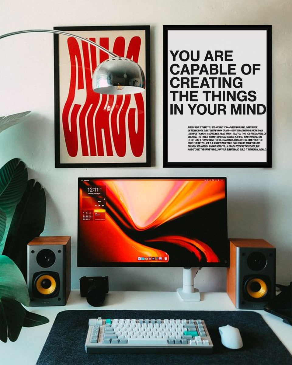 Poster in a minimalist styled workspace, emphasizing creativity and inspiration.