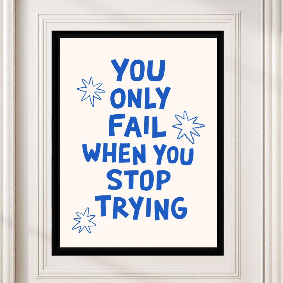The motivational poster displayed in a modern workspace with a vibrant aesthetic.
