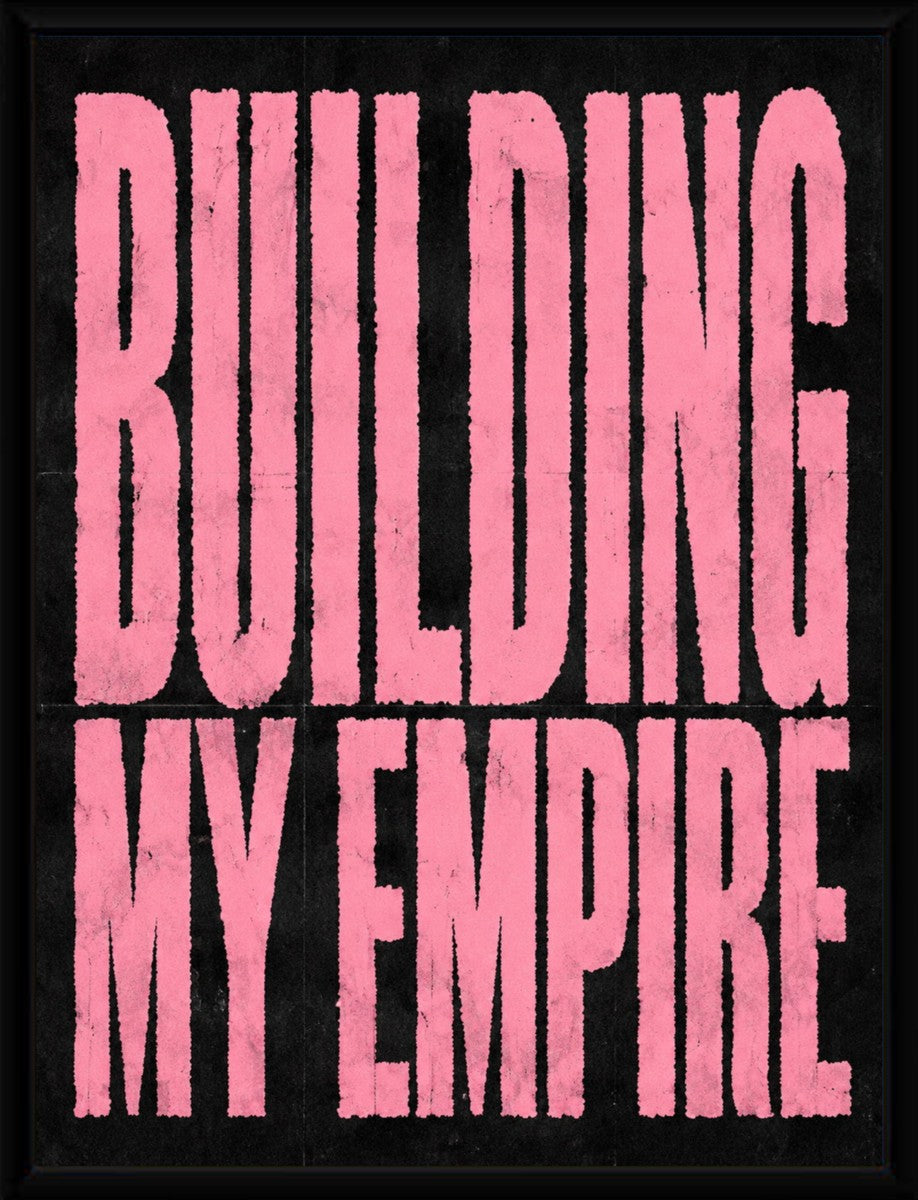 The 'Building My Empire' poster elegantly displayed in a sleek black frame.