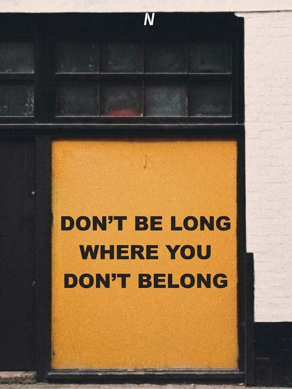 A motivational poster featuring the text 'DON'T BE LONG WHERE YOU DON'T BELONG' in a colorful design.