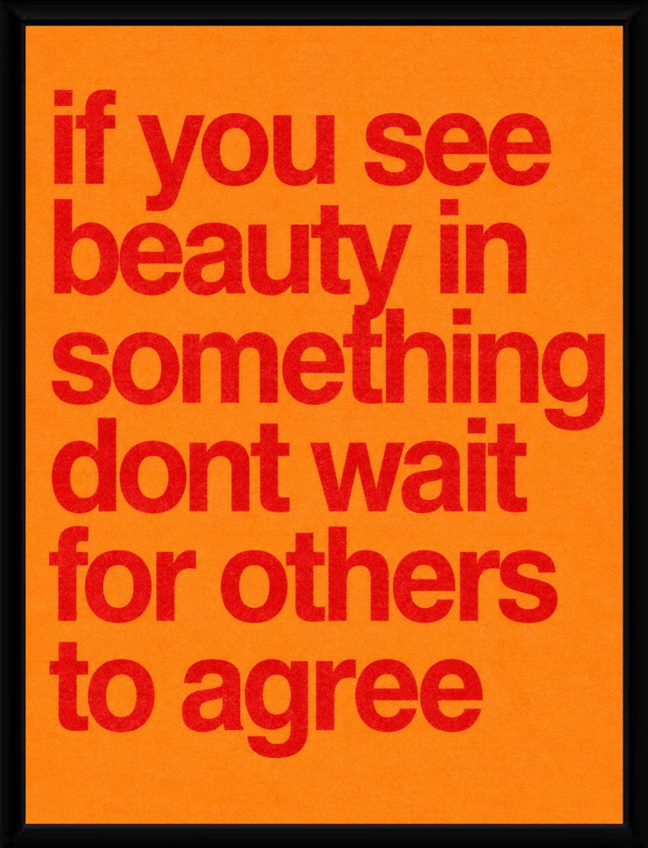 Framed motivational poster displaying the quote 'if you see beauty in something dont wait for others to agree'.