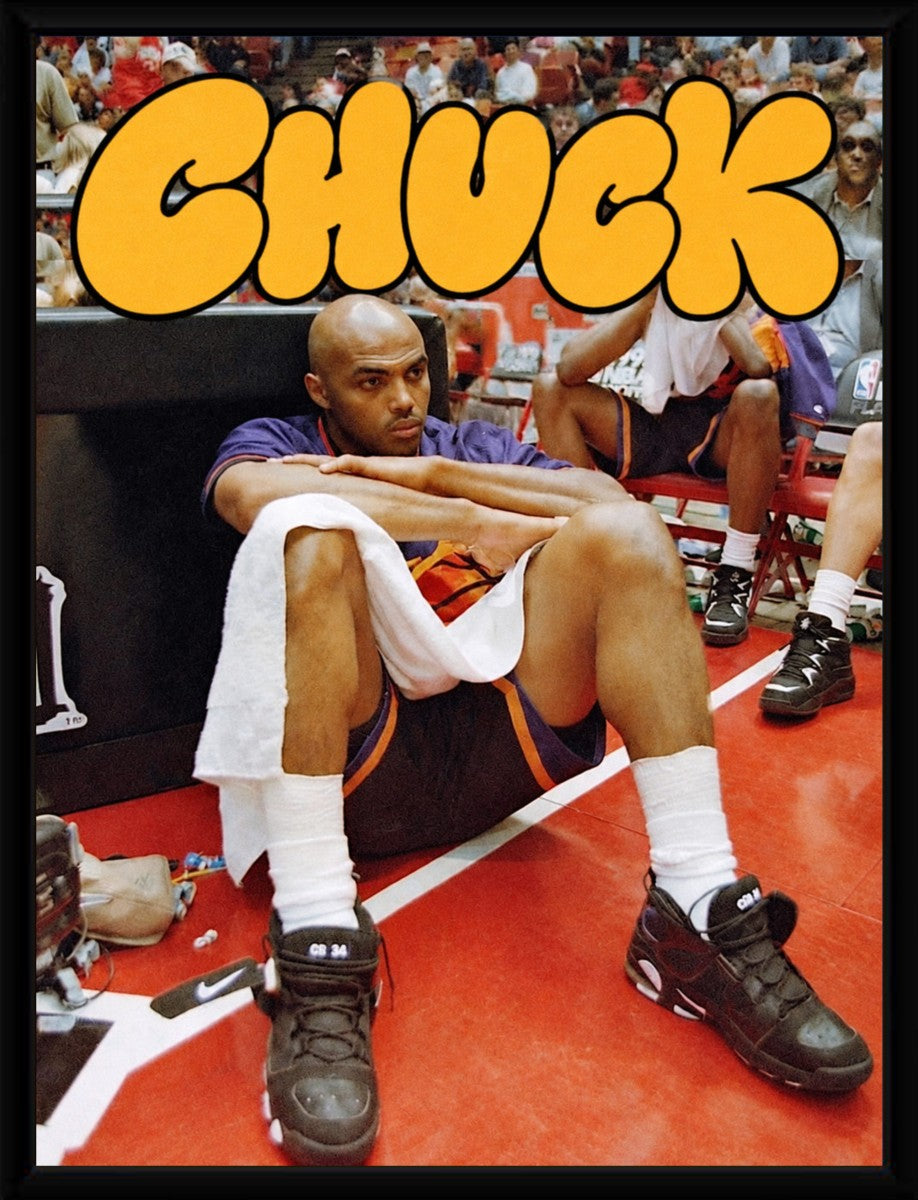 Charles Barkley poster elegantly framed, accentuating its vibrant colors and dynamic design.