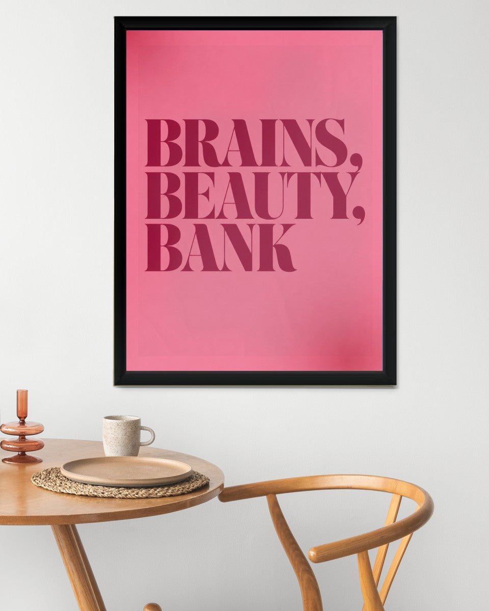 The 'BRAINS, BEAUTY, BANK' poster in a modern, colorful living space.