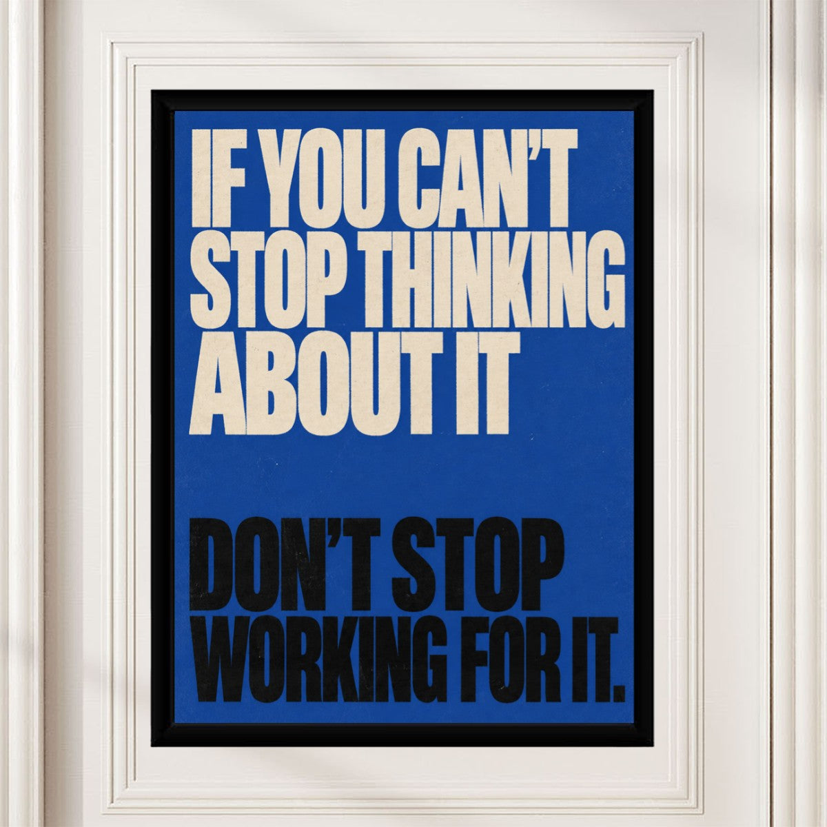 The poster displayed in a stylish office setting with natural light enhancing its colors.