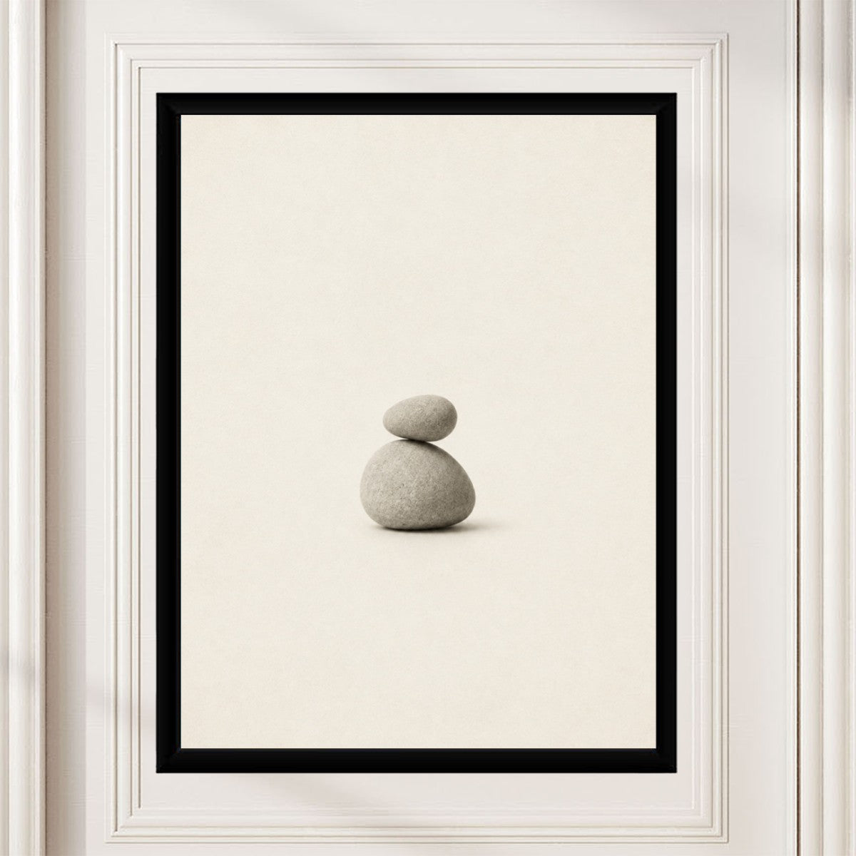 Balanced stones poster featured in a simple, modern room setting, highlighting its tranquil design.