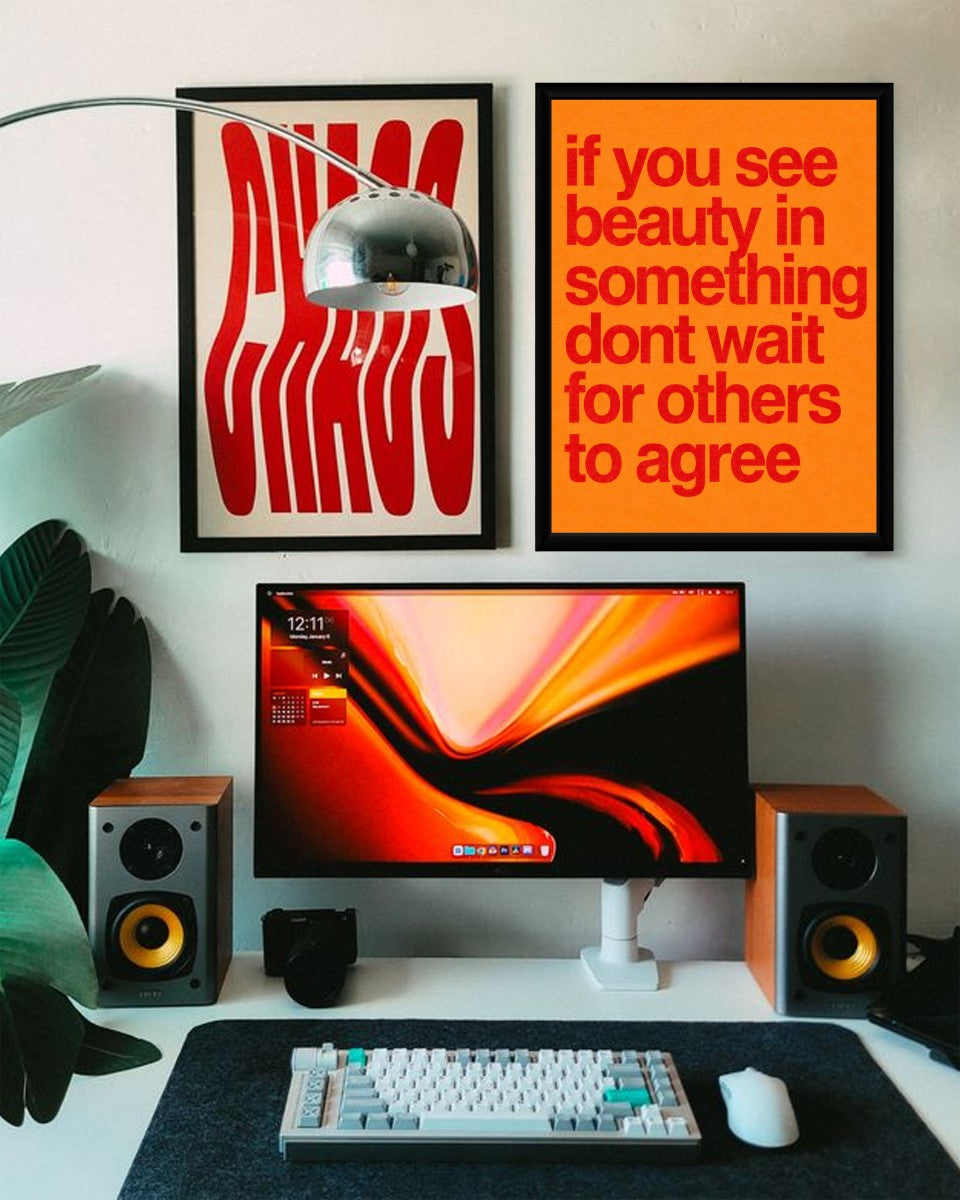 Colorful motivational poster displayed in a styled setting.