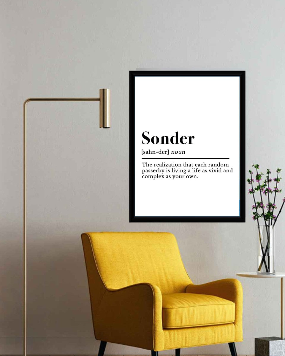 Sonder definition poster styled in a light and airy office setting.
