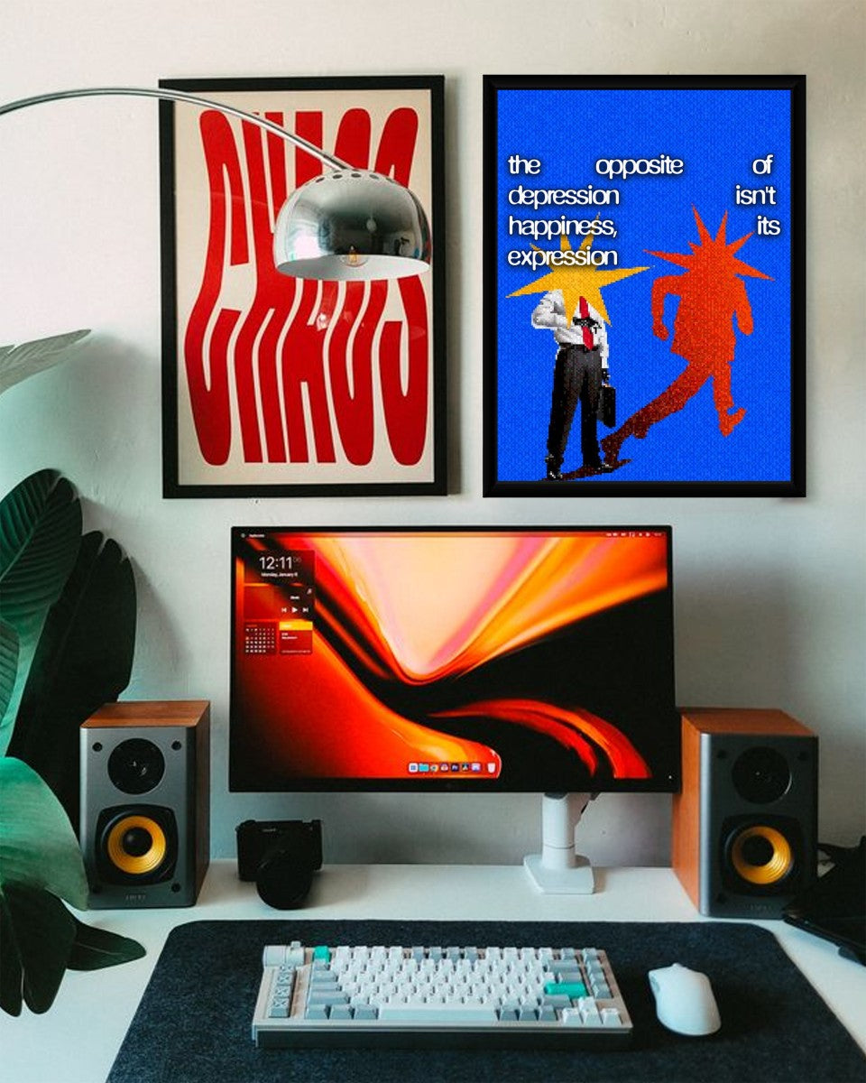 The poster in a stylish office setting, showcasing its vibrant colors and motivational text.