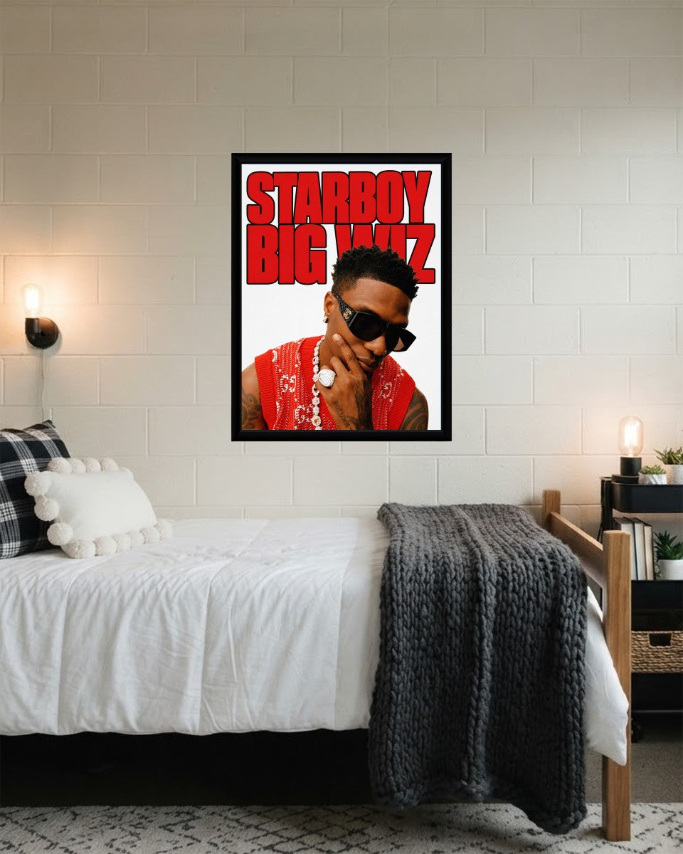 Wizkid Starboy poster featured in a modern workspace, adding a lively musical vibe.